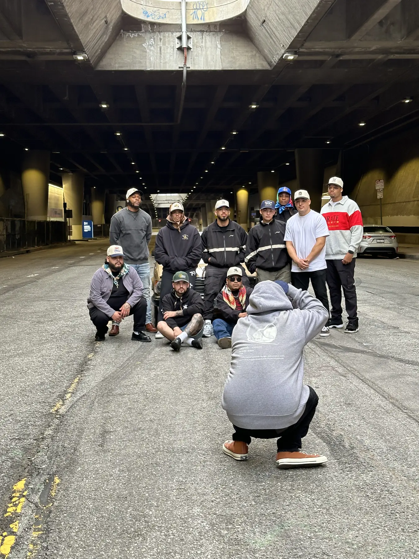 The Pirate Worldwide team beneath a Los Angeles overpass