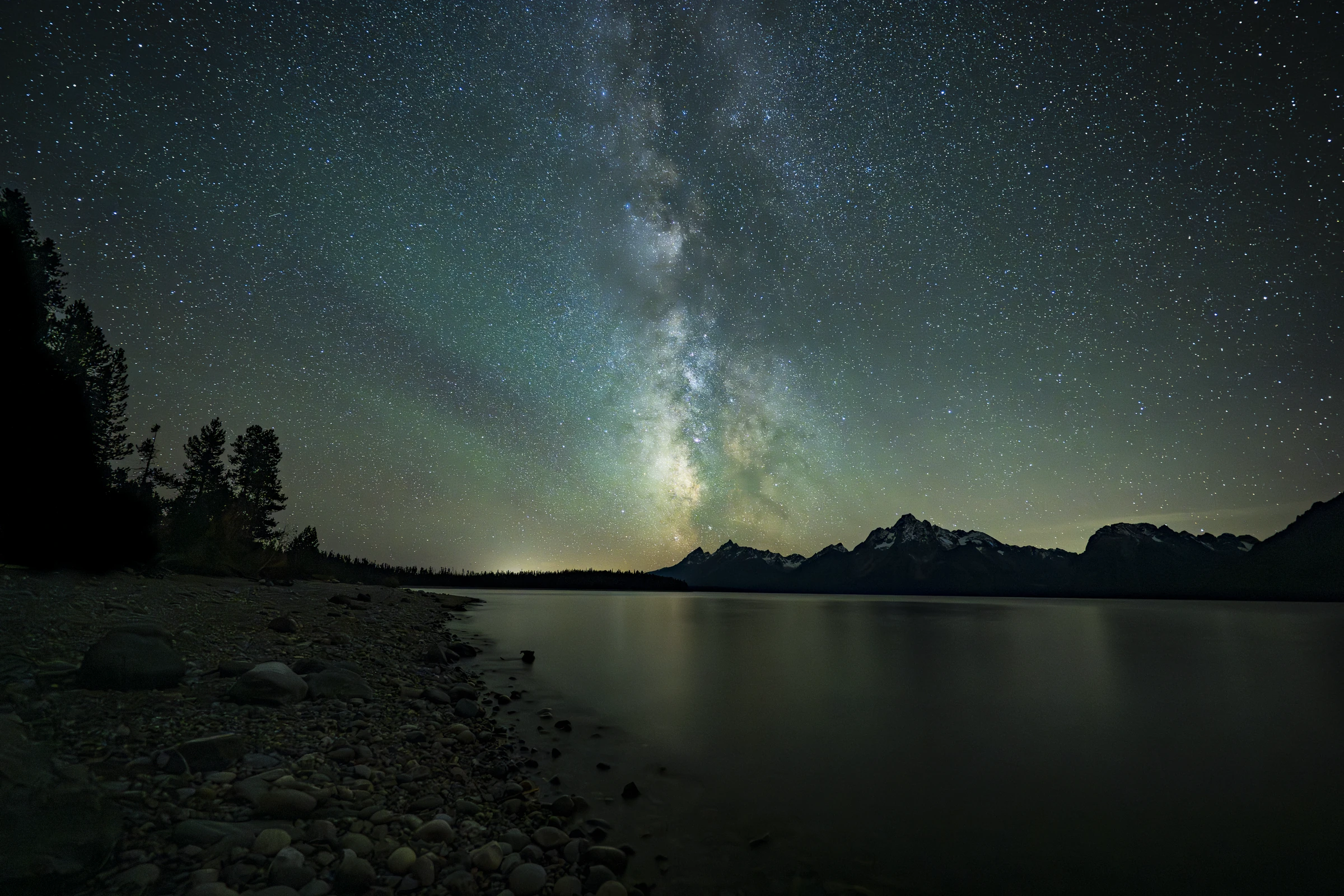 The Milky Way above the Tetons and a quiet lakeshore